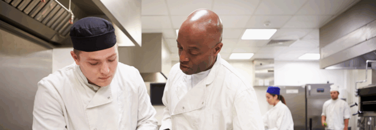 Male teacher in Food Technology lesson